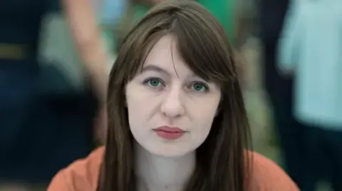 The acclaimed novelist declares she will not enter the UK due to legal concerns